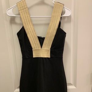fitted gold and black party dress